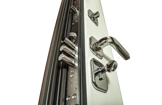 Imgi 18 New Armored Steel Door With Chrome Metal Locks And Handle Isolated At White Backdrop Closeup